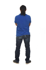Naklejka premium rear view of a man arms crossed on white background