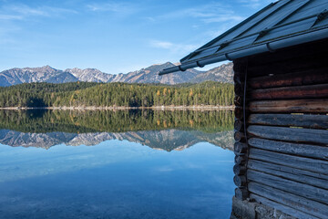 A wooden hut on the Eibsee in the Bavarian Alps
