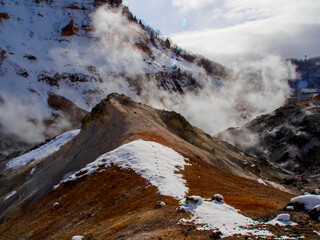 snow mountain with smog and sky clouds