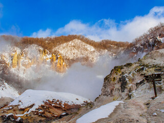 snow mountain with clouds and blue sky 