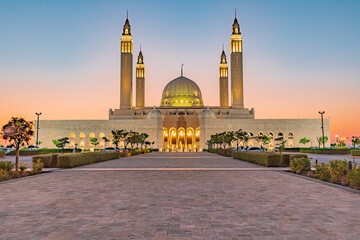 Middle East, Arabian Peninsula, Oman, Ad Dakhiliyah, Nizwa. Sunset at the Sultan Qaboos Grand Mosque.
