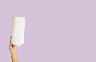 woman hand holds paper towel. Space for text