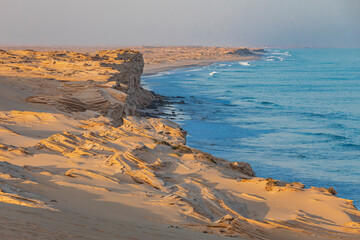 Middle East, Arabian Peninsula, Ash Sharqiyah North, Jalan Bani Buali. Surf on the coast of the Arabian Sea in Oman.