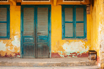 Vietnam, Hoi An. Detail of colorful building.