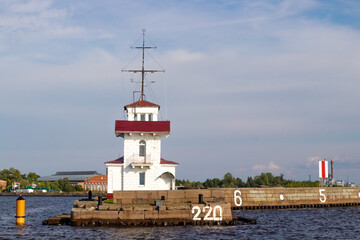 Fototapeta na wymiar View from sea on ship traffic service station on the Kronstadt breakwater in Saint Petersburg, Russia