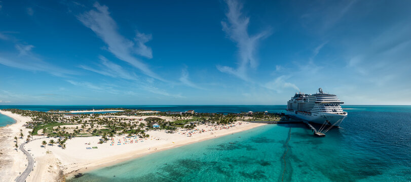 Panoramic Image of a Cruise Ship Docked at a Private Island in the Caribbean 