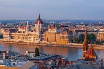 Obraz premium Hungary, Budapest. View of Hungary's Parliament, built between 1884-1902 is the country's largest building. It has 691 rooms and sits next to the Danube River.
