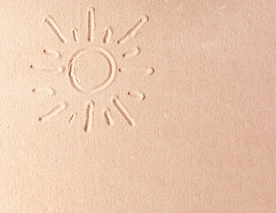 Drawn sun on the sand, concept, use as background