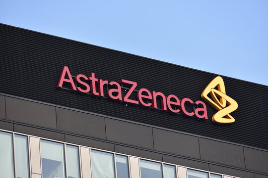 AstraZeneca sign, logo, symbol on the facade of AstraZeneca Poland, multinational pharmaceutical corporation, developer of COVID-19 vaccine. WARSAW, POLAND - NOVEMBER 28, 2021