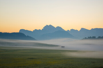 Europe, Italy, South Tirol. Sunrise on the Sasso Lungo and Sasso Piatto Mountains.