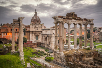 Fototapeta na wymiar Europe, Italy, Rome. Ruins of Roman Temple of Saturn.