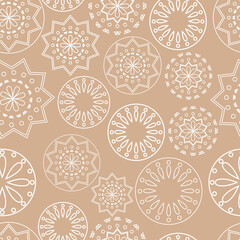 Vector illustration. Merry Christmas and Happy New Year seamless pattern. Line contour lace background with round abstract snowflakes. Perforated bright patterns Papel Picado pattern.