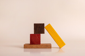 Wooden children's toys. Toys made of natural wood for educational games with children. Children's wooden constructor for an interesting educational game.