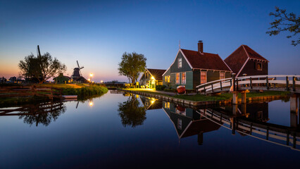 Naklejka na ściany i meble Europe, The Netherlands, Zaandam. Zaanse Schans at sunset.