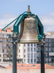 Portugal, Lisbon. Bell on the top of Rua Augusta Arch at Commerce Square.