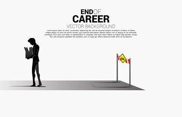 Fototapeta premium Unemployment man walk away from the end of road with dead end signage. Concept for end of career and jobless.