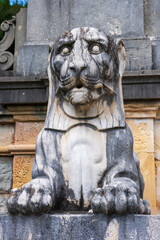 Fototapeta na wymiar Sinaia, Romania. Peles Castle. Statue of lion.