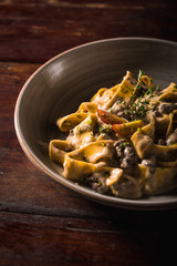 Delicious Pizza Classic Homemade Tomato Sauce Sausage Cheese Onion Chicken Meat Pasta Shrimp Restaurant Menu Gourmet on a wooden table Dark Background