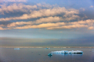 Sunset view of floating ice on Bering Sea, Russia Far East