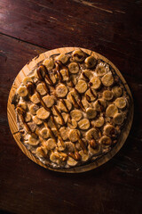 Delicious Pizza Classic Homemade Tomato Sauce Sausage Cheese Onion Chicken Meat Pasta Shrimp Restaurant Menu Gourmet on a wooden table with dark background