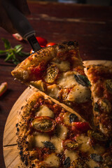 Delicious Pizza Classic Homemade Tomato Sauce Sausage Cheese Onion Chicken Meat Pasta Shrimp Restaurant Menu Gourmet on a wooden table Dark Background