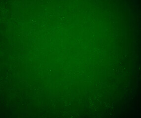 Green background without text and picture for the design. A spot of light in the center. Vignette of the dimming gradient. Copyspace