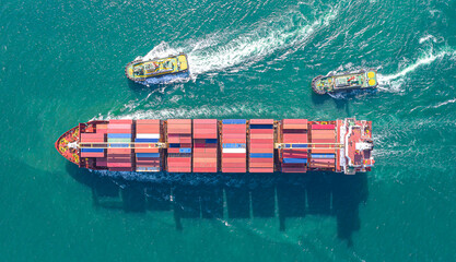 Aerial top view of cargo ship carrying container for import export goods  to customer,concept...