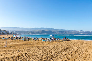 Las Canteras Beach (Playa de Las Canteras) in Las Palmas de Gran Canaria, Canary island, Spain. 3 km stretch of golden sand is the heart and soul of Las Palmas. One of the top Urban Beaches in Europe - obrazy, fototapety, plakaty