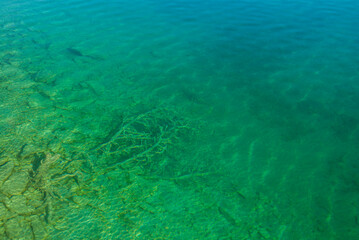 Fototapeta na wymiar Sweden, Gotland Island, Labro, Bla Lagunen, Blue Lagoon, natural swimming area in former chalk quarry with blue green water
