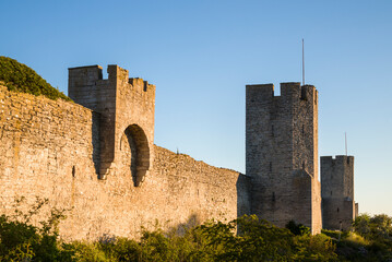 Fototapeta premium Sweden, Gotland Island, Visby, 12th century city wall, most complete medieval city wall in Europe, dawn
