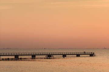Sweden, Scania, Malmo, Riberborgs Stranden beach area, pier at sunset