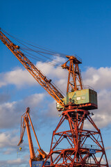 Fototapeta na wymiar Sweden, Vastragotland and Bohuslan, Gothenburg, shipyard crane, city skyline
