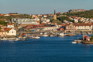 Sweden, Bohuslan, Kungshamn, high angle view of town and harbor, sunset