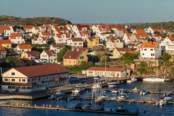 Sweden, Bohuslan, Kungshamn, high angle view of town and harbor, sunset