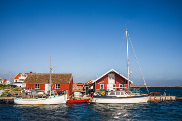 Fototapeta na wymiar Sweden, Bohuslan, Kungshamn, red fishing shacks in the Fisketangen, old fisherman's neighborhood