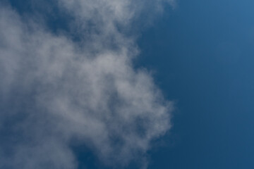 Clouds on Left with Blue Sky on Right