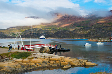 Dock in the harbor, Qeqertarsuaq, Greenland © Danita Delimont
