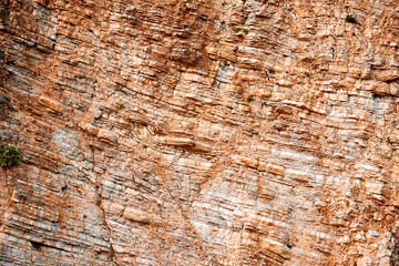 Yellow cut rock texture. Abstract natural backgrounds