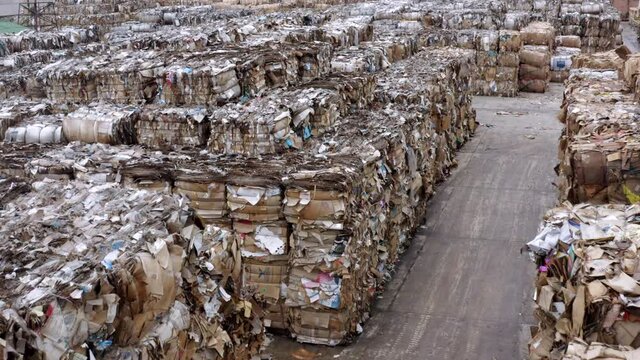aerial shot of recycled paper mil dump cartboard