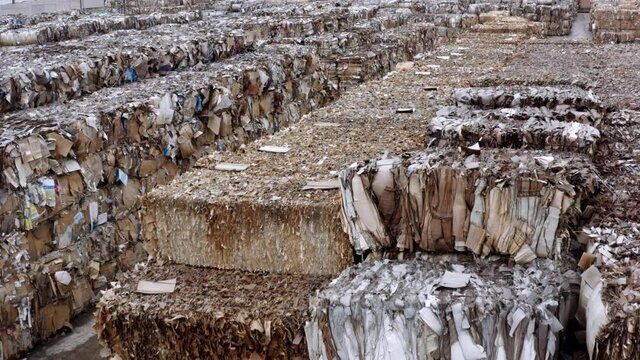 aerial shot of recycled paper mil dump cartboard