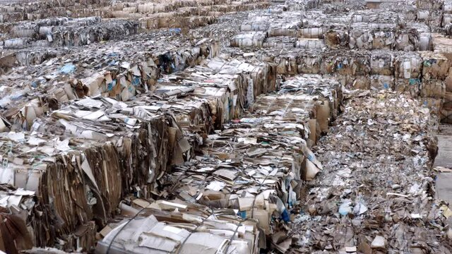 aerial shot of recycled paper mil dump cartboard