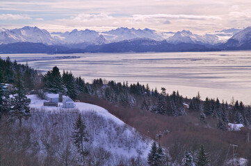 Landscape of snow covered mountain range and river, Homer, Alaska, US - obrazy, fototapety, plakaty