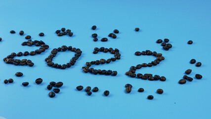 idea and creative number 2022, coffee beans on a blue background