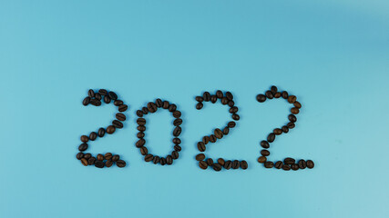 idea and creative number 2022, coffee beans on a blue background