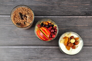 Homemade Muesli with greek yogurt cranberry, nuts and apple . Healthy energy breakfast.