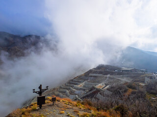 Fuming volcanic valley in autumn (Owakudani, Hakone, Kanagawa, Japan)