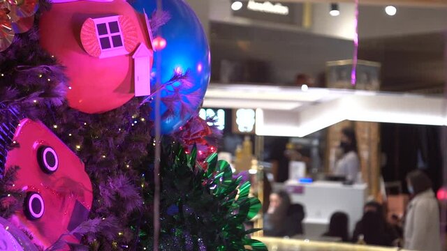 Christmas Decoration at Shopping Mall with Incidental People in Background