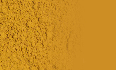 Organic Curcuma Powder, a bright yellow chemical produced by the turmeric plant. Science background.