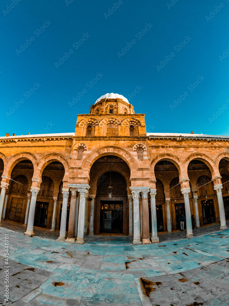 Wall mural low angle shot of zaytuna mosque in tunisia