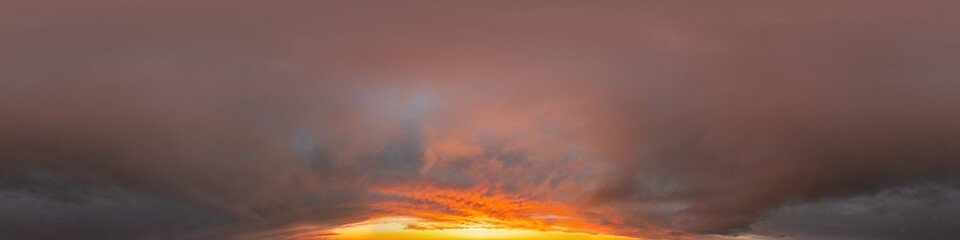 Red burning sunset sky panorama with Cumulus clouds. Seamless hdr 360 pano in spherical equirectangular format. Complete zenith for 3D visualization, game, sky replacement for aerial drone panoramas